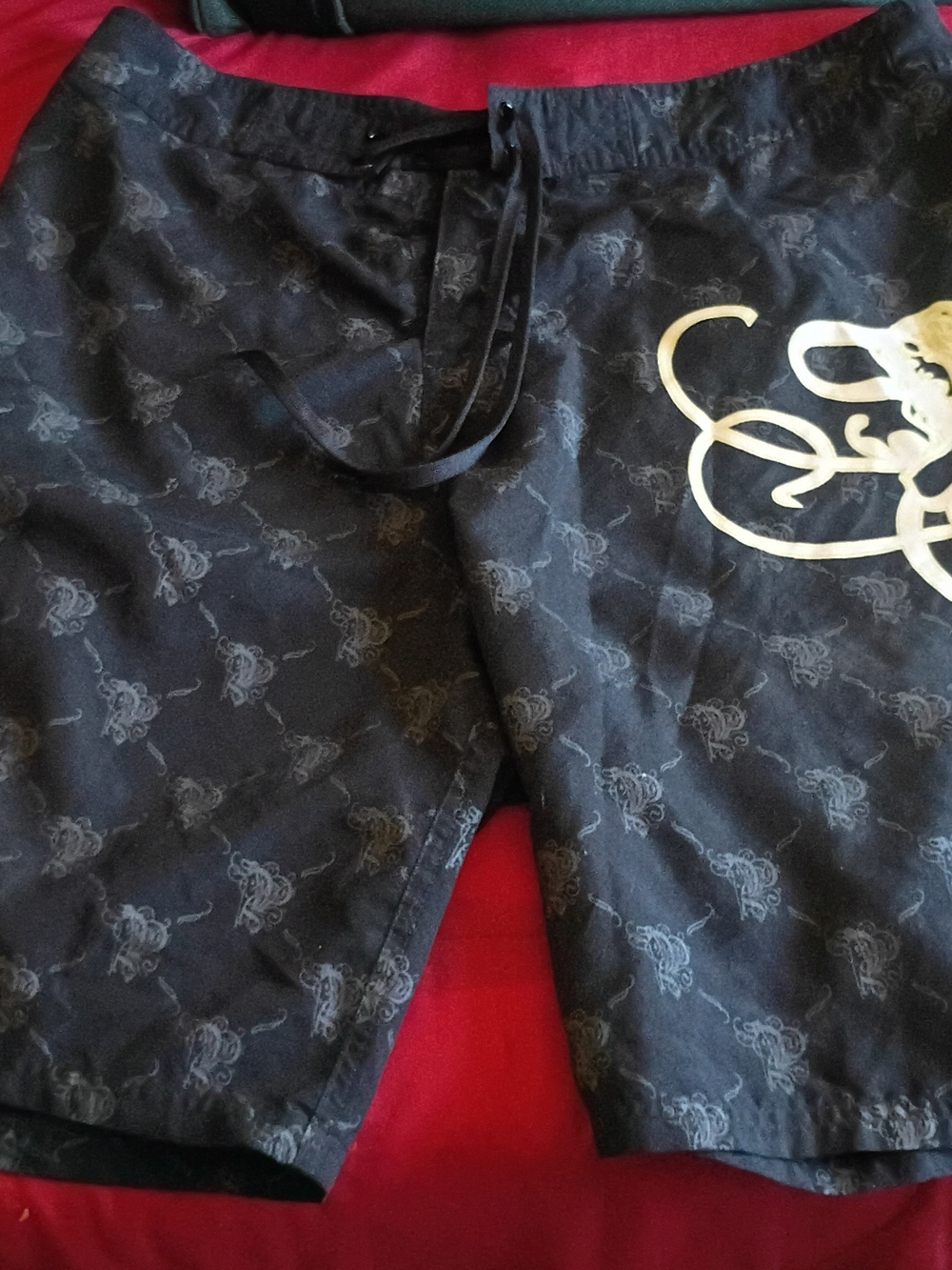 Pimpermill Black Graphic Swim Trunks with Gold Octopus Accent